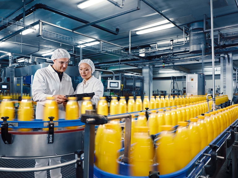 Orange juice filling in a beverage plant